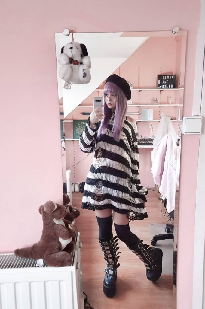 Oversized Distressed Striped Sweater + Black Thigh-high Socks + Buckled Platform Boots