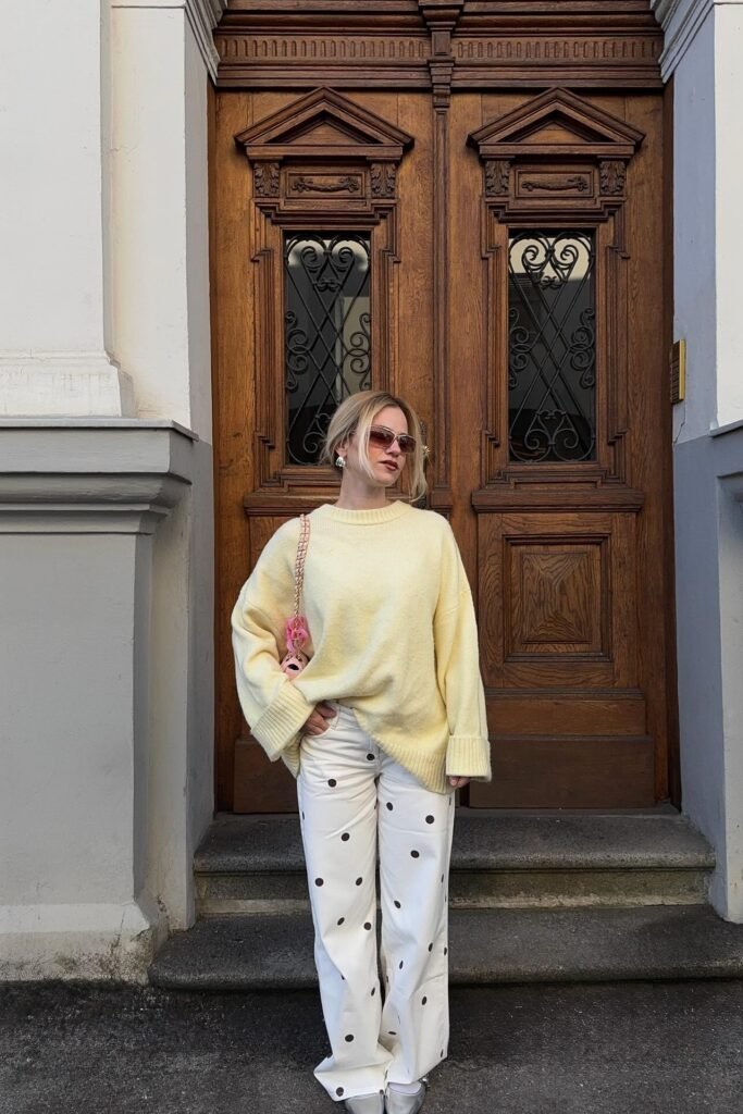 Oversized Pale Yellow Sweater + White Polka Dot Wide-Leg Jeans + Silver Ballet Flats