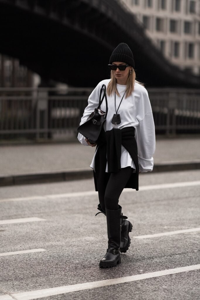 Oversized White Long Sleeve Tee + Black Knit Beanie + Black Leggings + Black Lug Sole Tall Boots