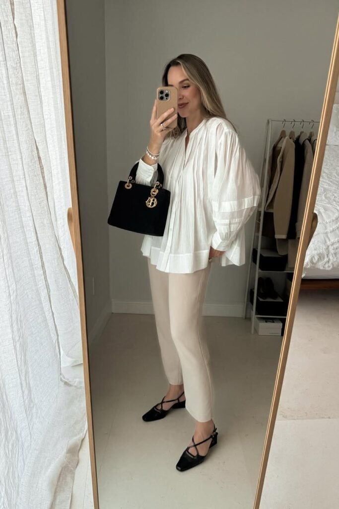 Oversized White Pleated Blouse + Beige Tapered Trousers + Black Criss-Cross Slingback Heels
