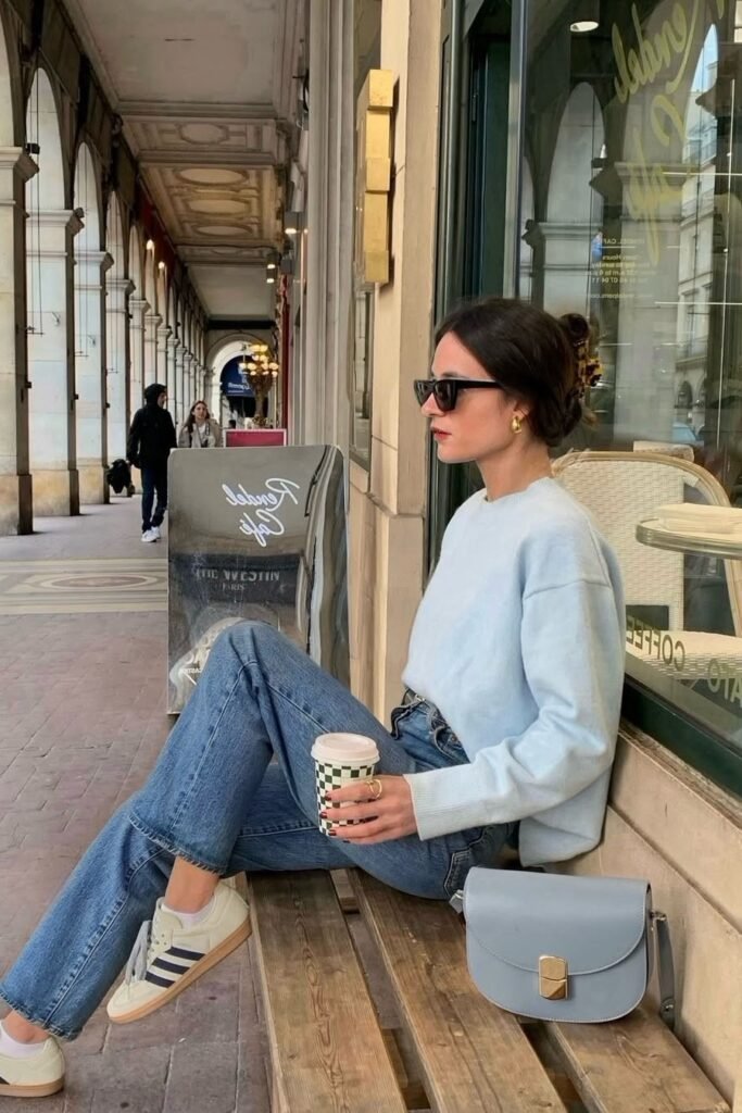 Pale Blue Crewneck Sweater + Straight-Leg Blue Jeans + White and Black Sneakers