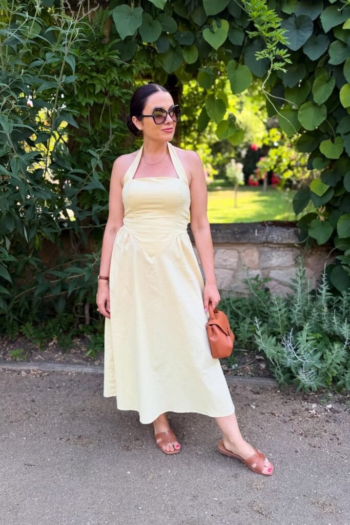 Pale Yellow Halter Midi Dress + Tan Leather Slides + Brown Handbag