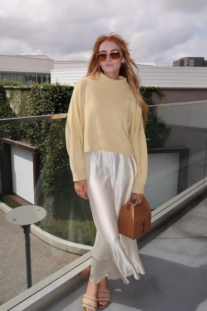 Pale Yellow Sweater + White Satin Midi Skirt + Beige Logo Slides
