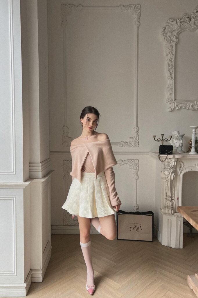 Peach Off-the-Shoulder Wrap Sweater + White Tweed Mini Skirt + White Knee-High Stockings + Pink Pointed Flats