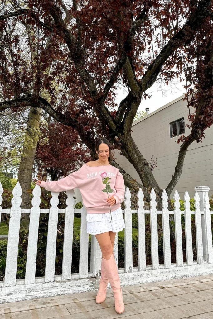 Pink "Beverly Hills" Off-the-Shoulder Sweatshirt + White Ruffled Mini Skirt + Pink Cowboy Boots