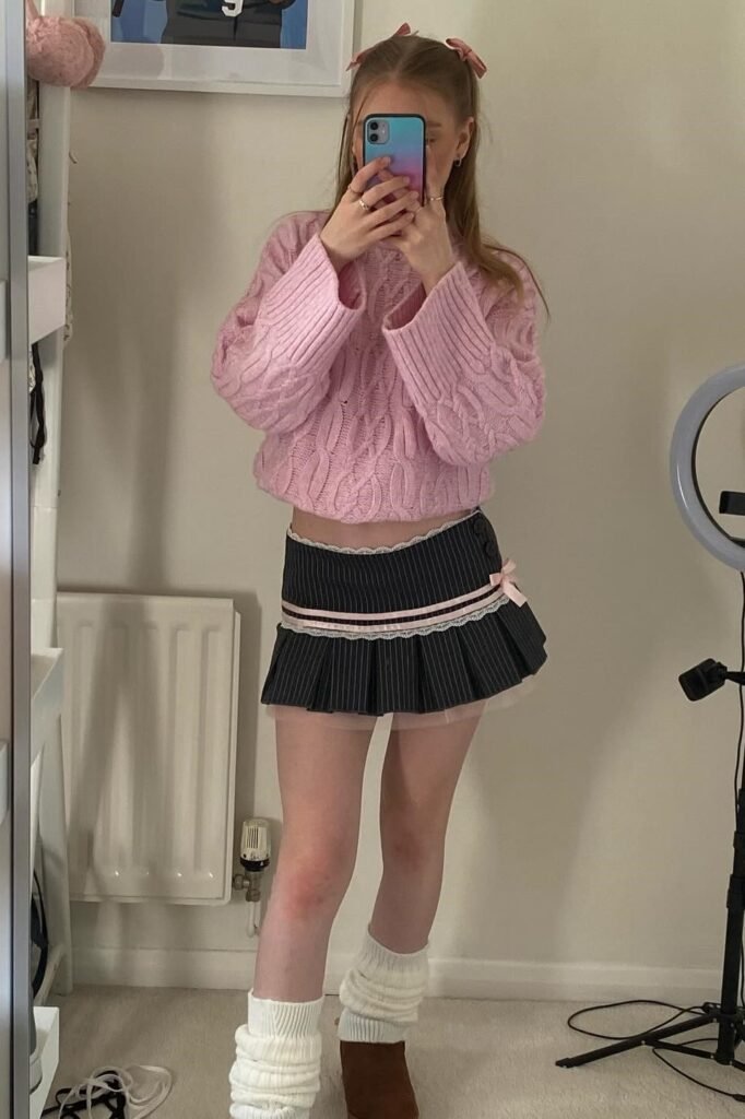 Pink Cable Knit Oversized Sweater + Pinstripe Mini Skirt with Bow + White Leg Warmers + Brown Boots