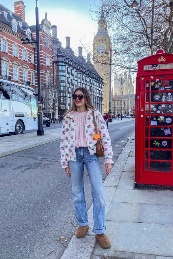 Pink Cable Knit Sweater + Floral Fleece Zip-Up Jacket + Light Wash Straight Leg Jeans + Chestnut Platform Boots