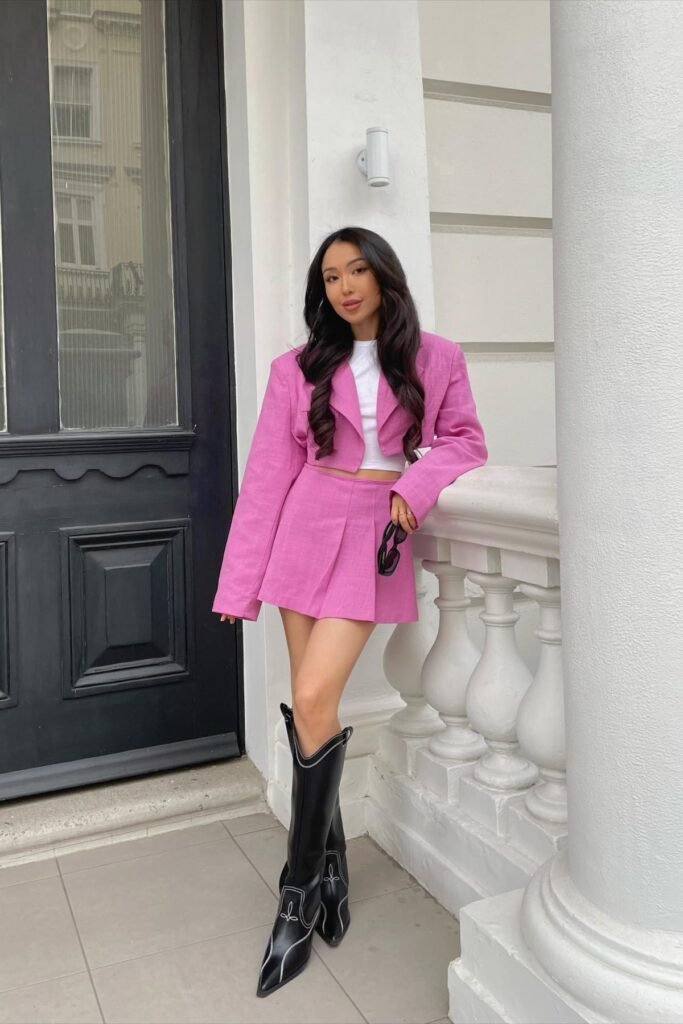 Pink Cropped Blazer + White Crop Top + Pink Pleated Mini Skirt + Black Western Boots
