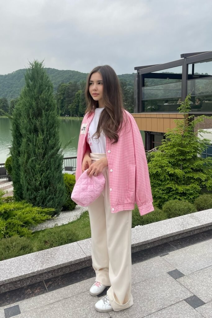 Pink Gingham Jacket + White Graphic Tee + Cream Wide-Leg Trousers + White Sneakers