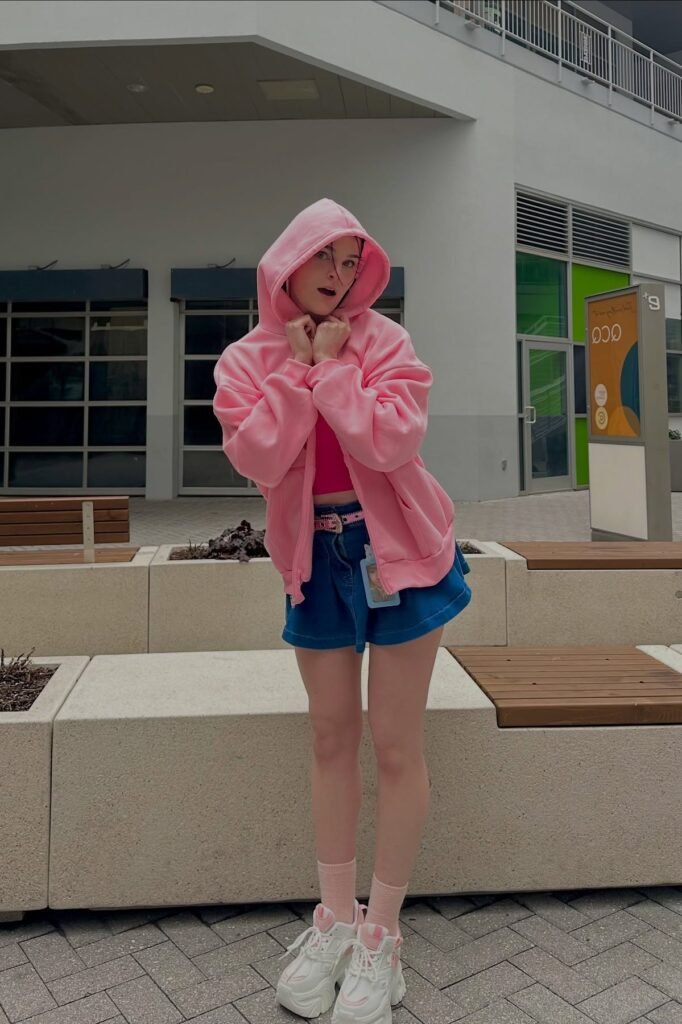 Pink Zip-Up Hoodie + Denim Mini Skirt + Chunky White Sneakers