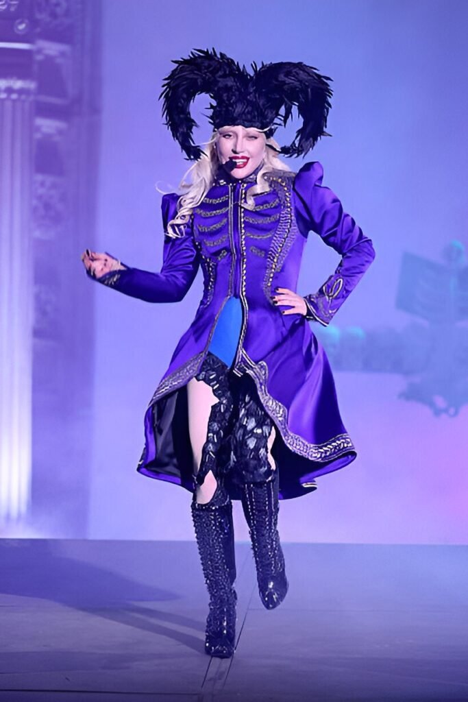 Purple Military-style Tunic with Gold Embroidery + Black Patterned Leggings + Studded Black Knee-High Boots