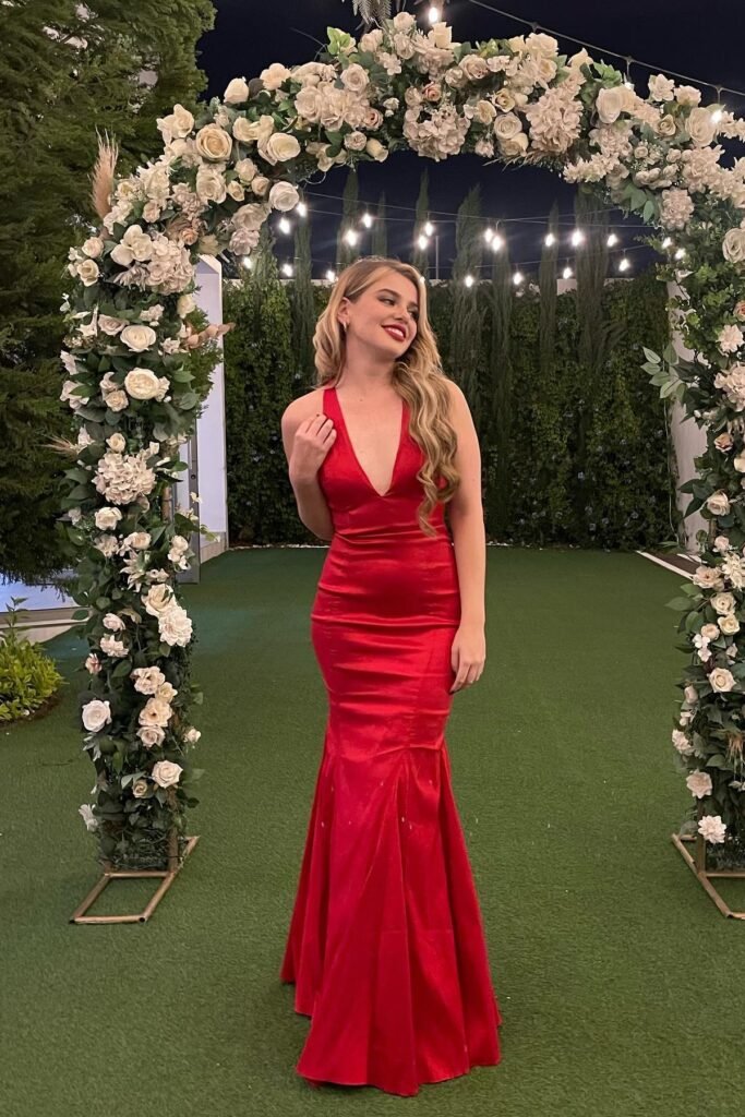 Red Sleeveless Mermaid Gown + Gold Hoop Earrings