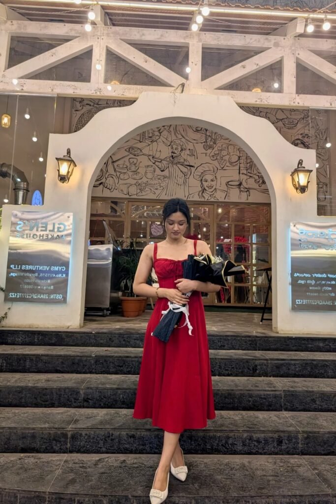 Red Strappy Midi Dress with Ruched Bust + White Bow Pumps + Black Floral Bouquet