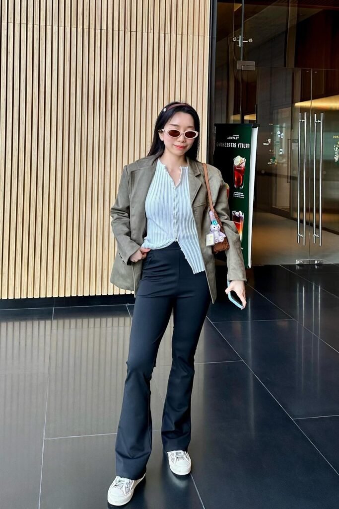 Sage Green Blazer + White Ribbed Button-Up Shirt + Black Flared Trousers + White Patterned Sneakers