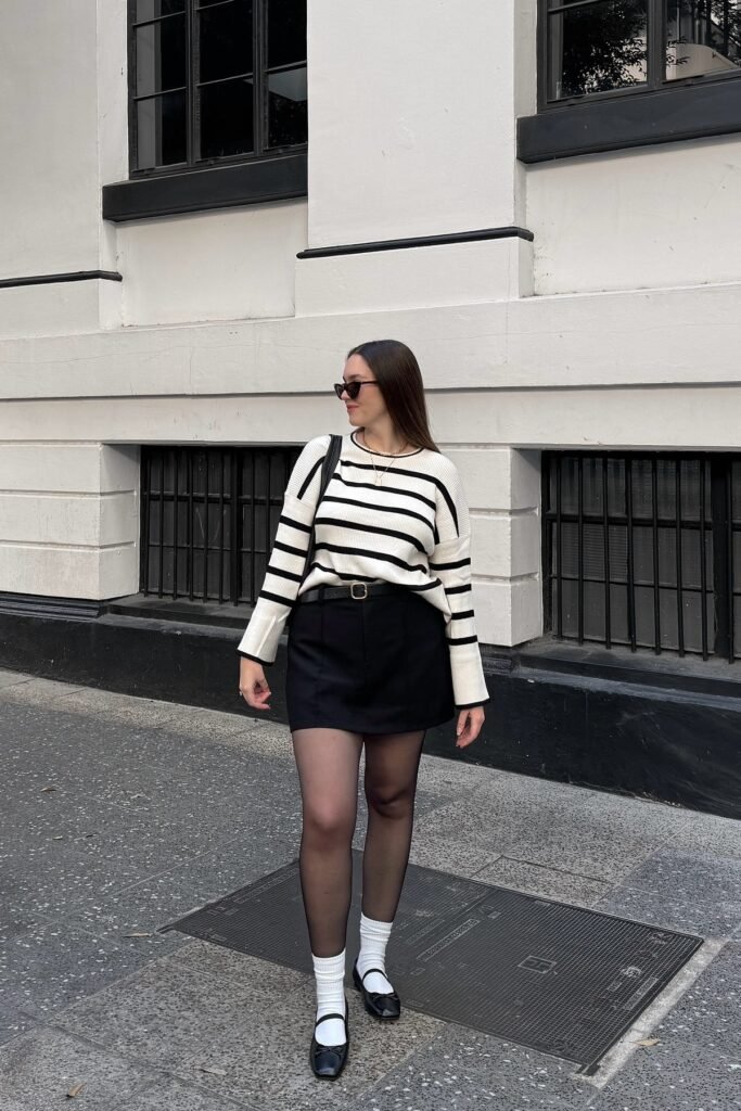 Striped Crewneck Sweater + Black Mini Skort + White Socks & Black Mary Janes