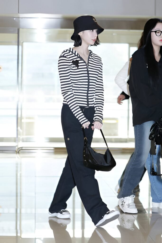 Striped Zip-Up Hoodie + Black Wide-Leg Trousers + Black Bucket Hat + White Sneakers
