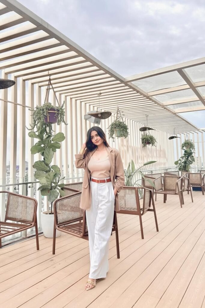 Tan Blazer + Beige Ribbed Tank Top + White Wide-Leg Trousers + Tan Belt + Gold Sandals