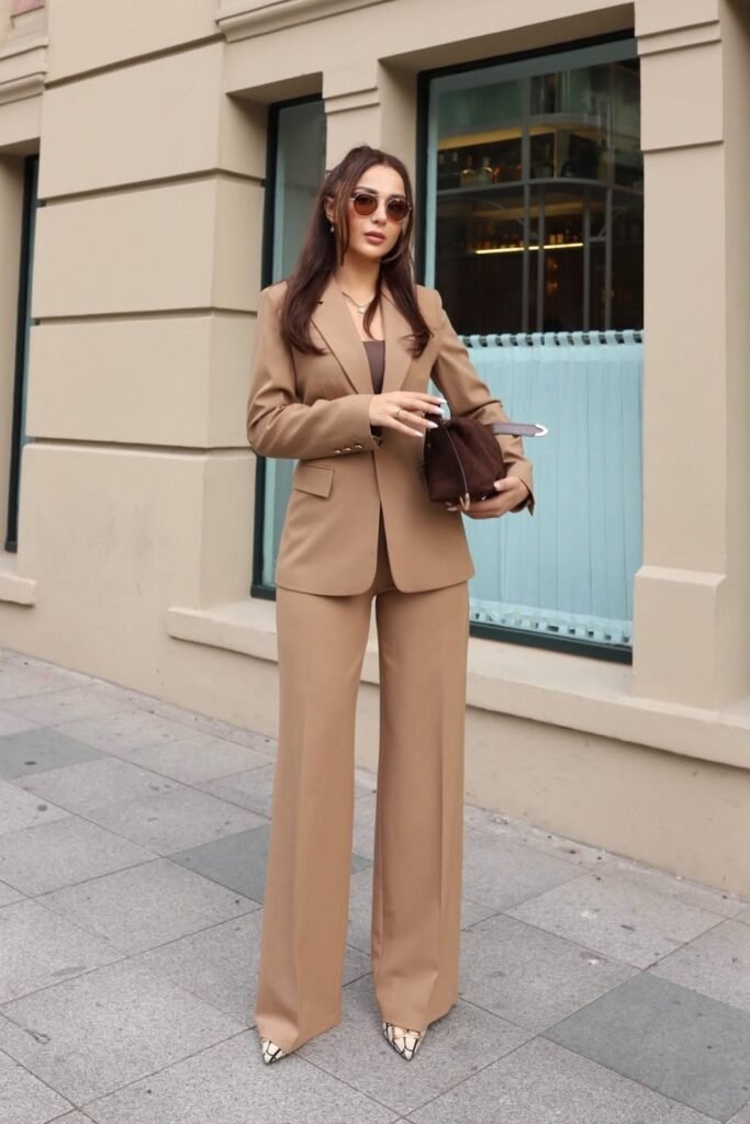 Tan Tailored Suit + Brown Square-Neck Top + Round Sunglasses + Patterned Pointed-Toe Heels