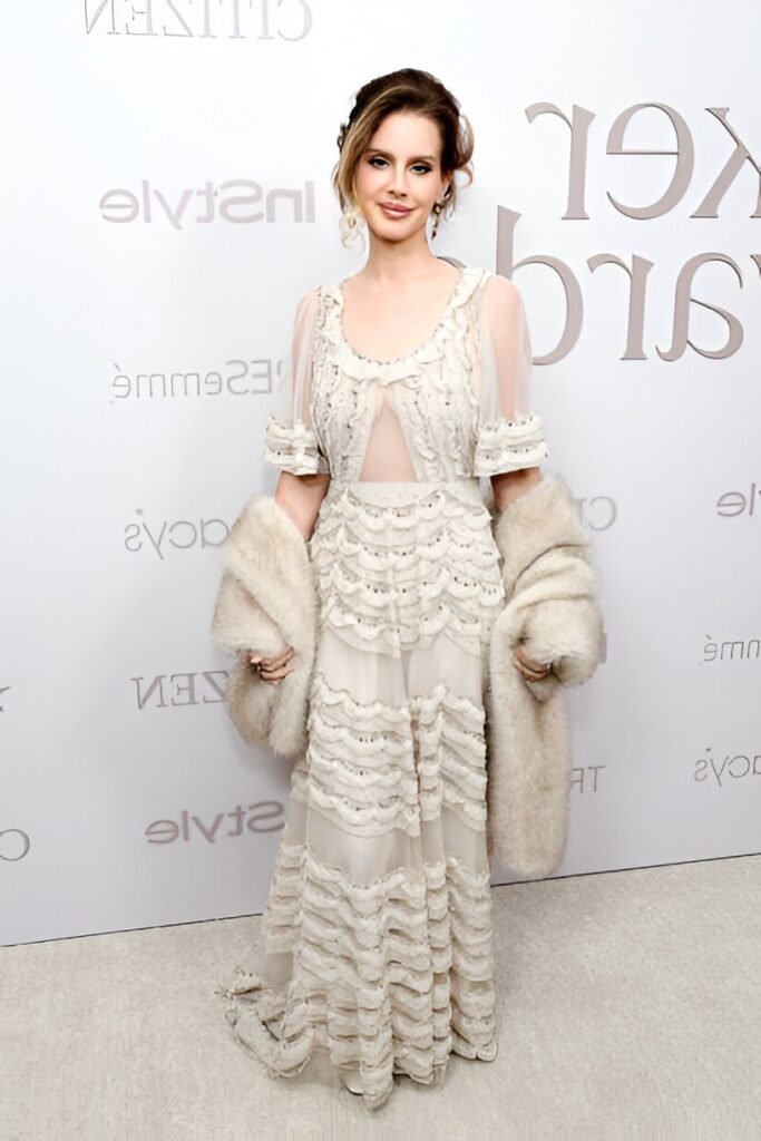 Tiered Cream Ruffle Gown + Oversized Faux Fur Stole + Loose Updo