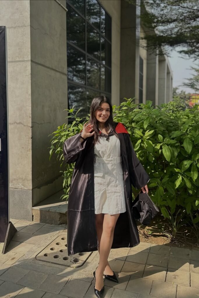 White Belted Mini Dress + Black Graduation Gown + Black Pointed-Toe Flats