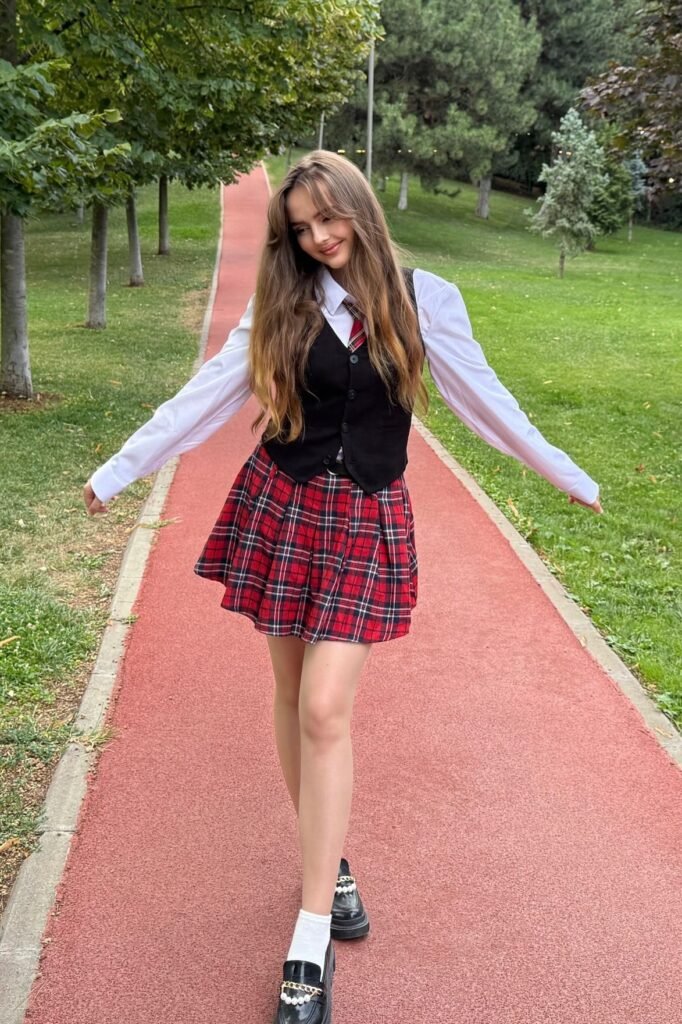 White Button-Down Shirt + Black Waistcoat + Red Plaid Mini Skirt + Black Loafers