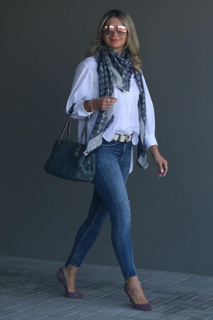 White Button-Down Shirt + Distressed Skinny Jeans + Purple Suede Pumps + Blue Monogram Scarf