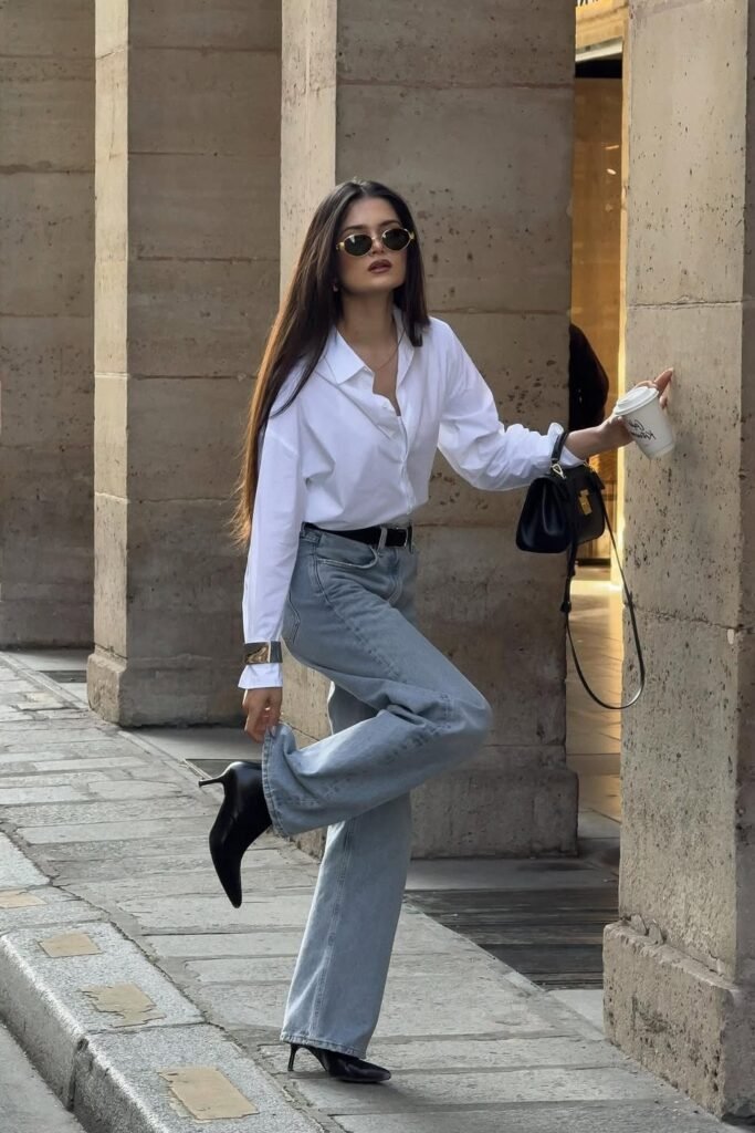 White Button-Down Shirt + Light Wash Flare Jeans + Black Pointed Boots