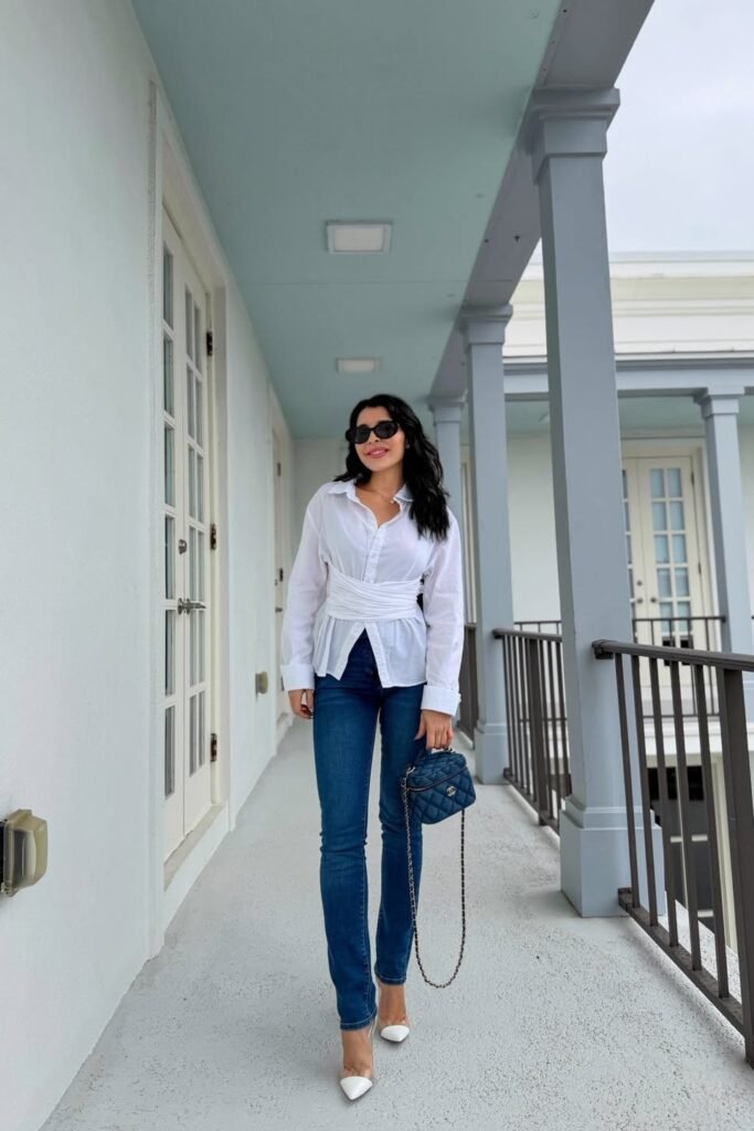 White Button-Down Shirt with Waist Wrap + Dark Wash Slim Jeans + White Cap-Toe Heels