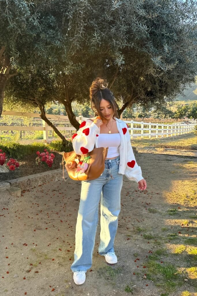 White Cardigan with Red Hearts + White Tube Top + Light Wash Wide-Leg Jeans + White Sneakers