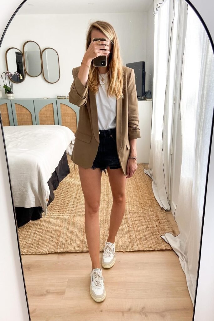 White Crewneck T-Shirt + Black Denim Cut-Off Shorts + Tan Tailored Blazer + White Low-Top Sneakers