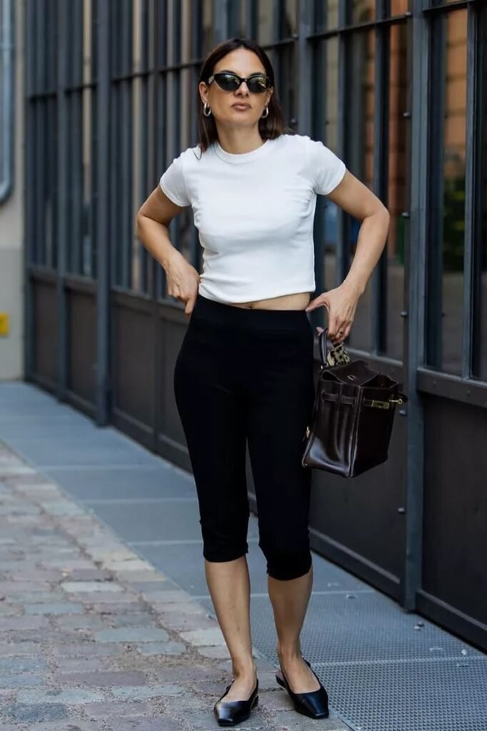 White Cropped T-Shirt + Black Capri Leggings + Black Square-Toe Ballet Flats