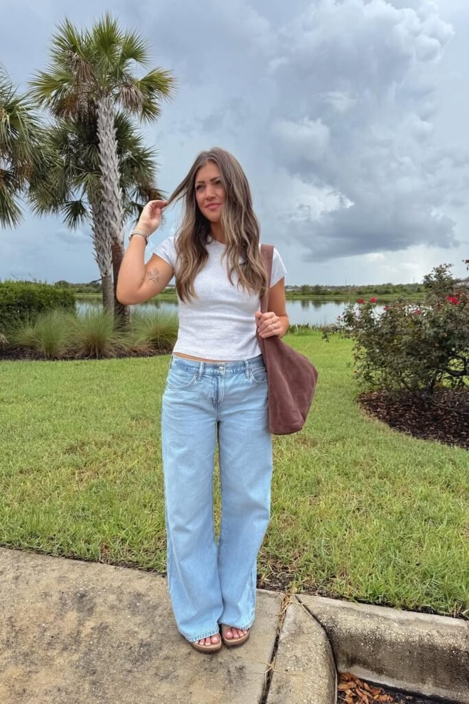 White Cropped T-Shirt + Light Wash Baggy Jeans + Tan Birkenstock Sandals