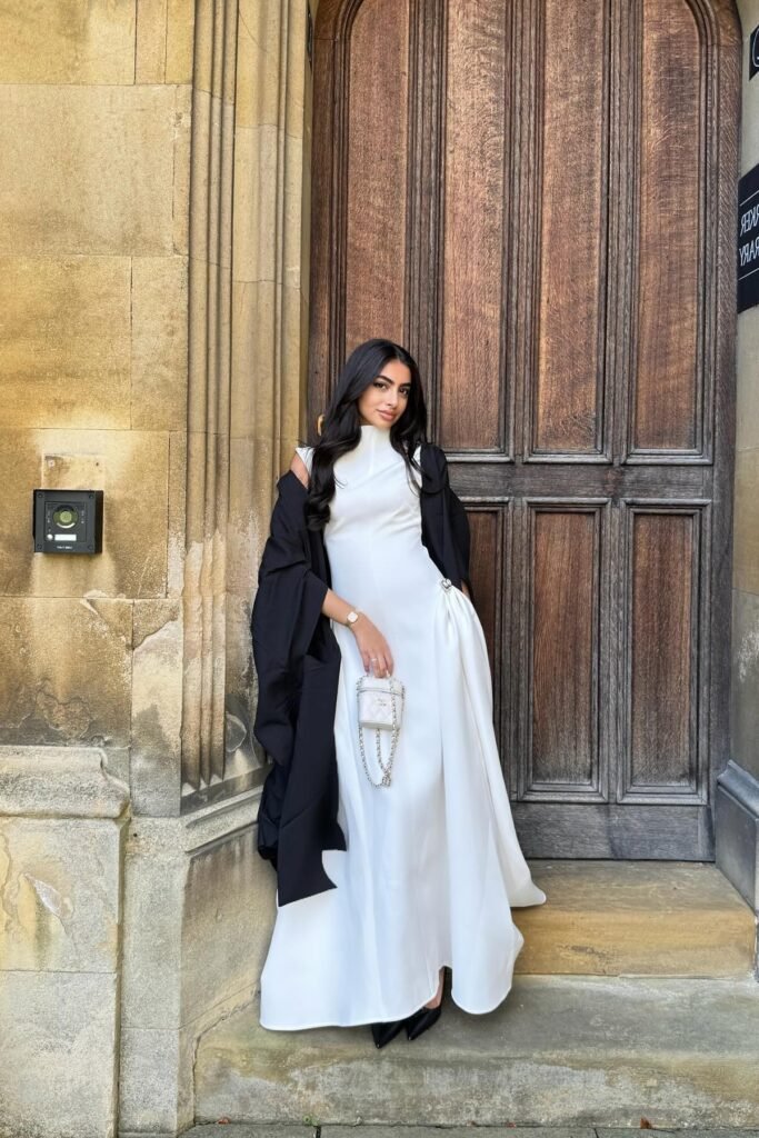 White High-Neck Maxi Dress + Black Graduation Gown + White Quilted Vanity Bag