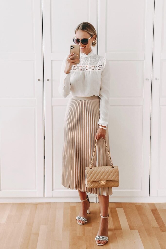White Lace High-Neck Blouse + Beige Pleated Midi Skirt + Embellished Strappy Heeled Sandals