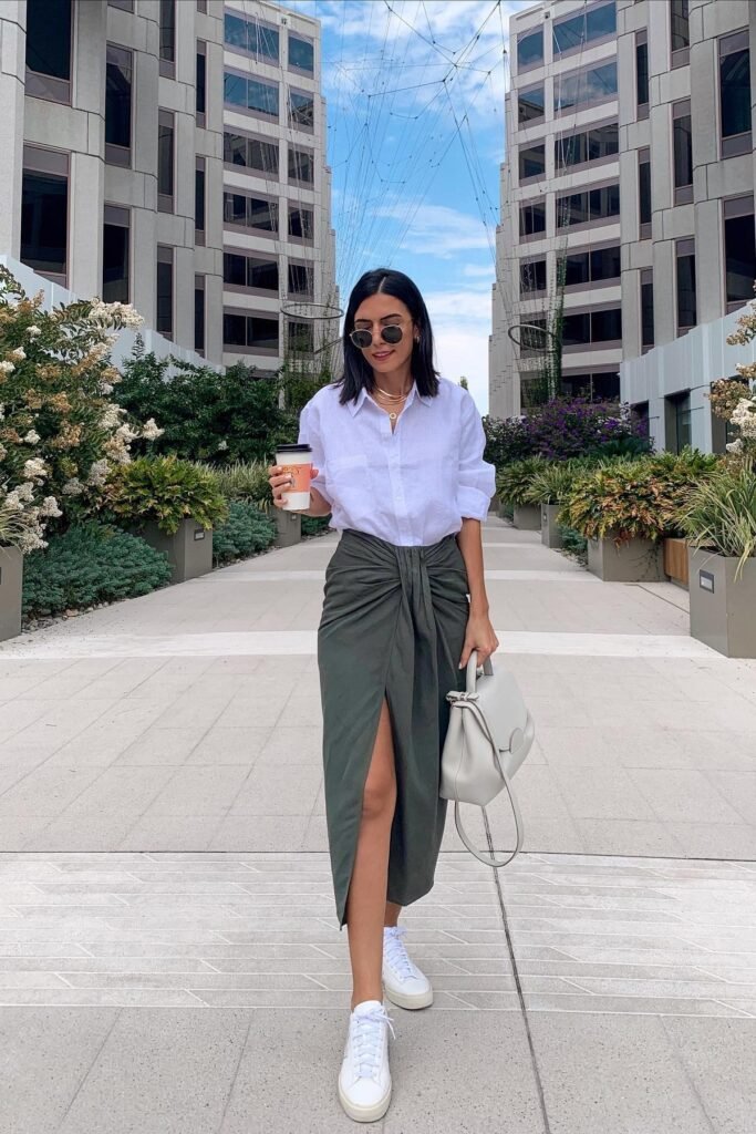 White Linen Button-Down Shirt + Olive Green Knot-Detail Midi Skirt + White High-Top Sneakers