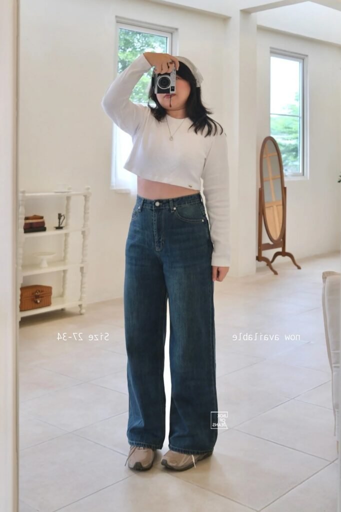 White Long-Sleeve Crop Top + Dark Wash Wide-Leg Jeans + Beige Athletic Sneakers