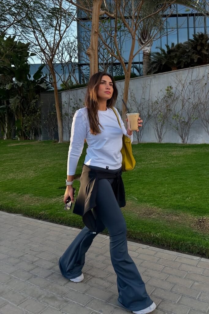 White Long-sleeve T-shirt + Charcoal Flare Leggings + White Sneakers