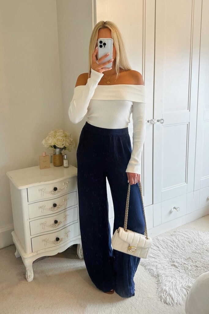 White Off-The-Shoulder Long Sleeve Top + Navy Wide-Leg Trousers + White Quilted Chain Bag