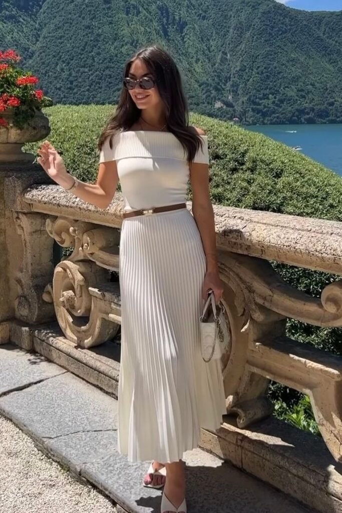 White Off-the-Shoulder Ribbed Top + White Pleated Maxi Skirt + White Strappy Sandals