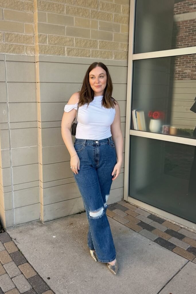 White One-Shoulder Cut-Out Top + Distressed Wide Leg Jeans + Silver Pointed-Toe Flats
