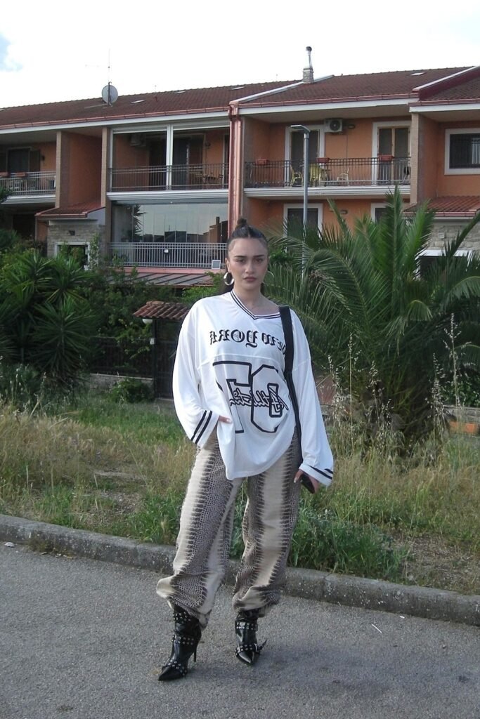 White Oversized Graphic Jersey + Snakeskin Print Cargo Pants + Black Studded Pointed Boots