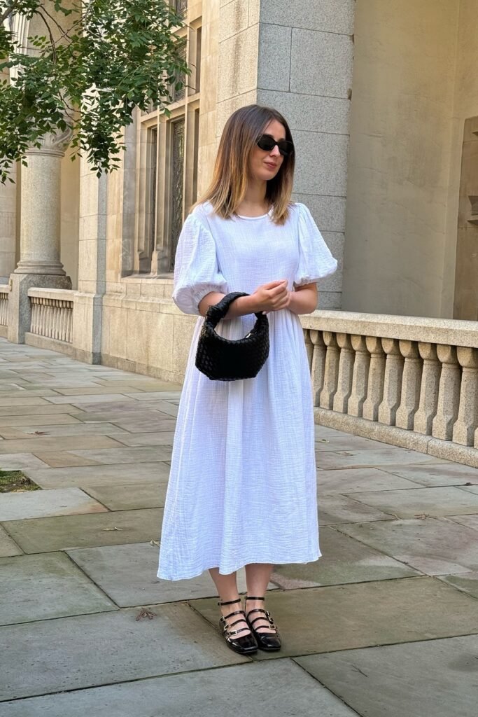 White Puff-Sleeve Midi Dress + Black Woven Handbag + Black Multi-Strap Flats