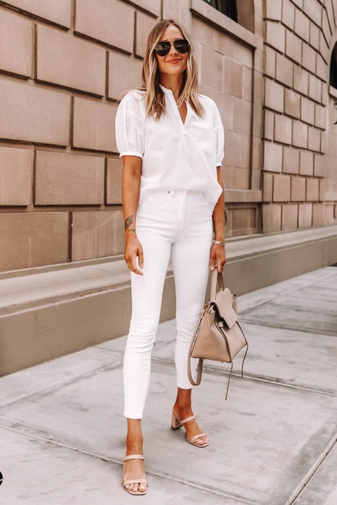 White Puff-Sleeve V-Neck Blouse + White Skinny Jeans + Nude Double-Strap Heeled Sandals