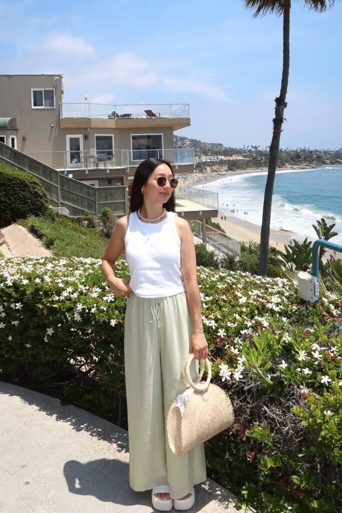 White Ribbed Tank Top + Sage Green Wide-Leg Trousers + Woven Half-Moon Bag