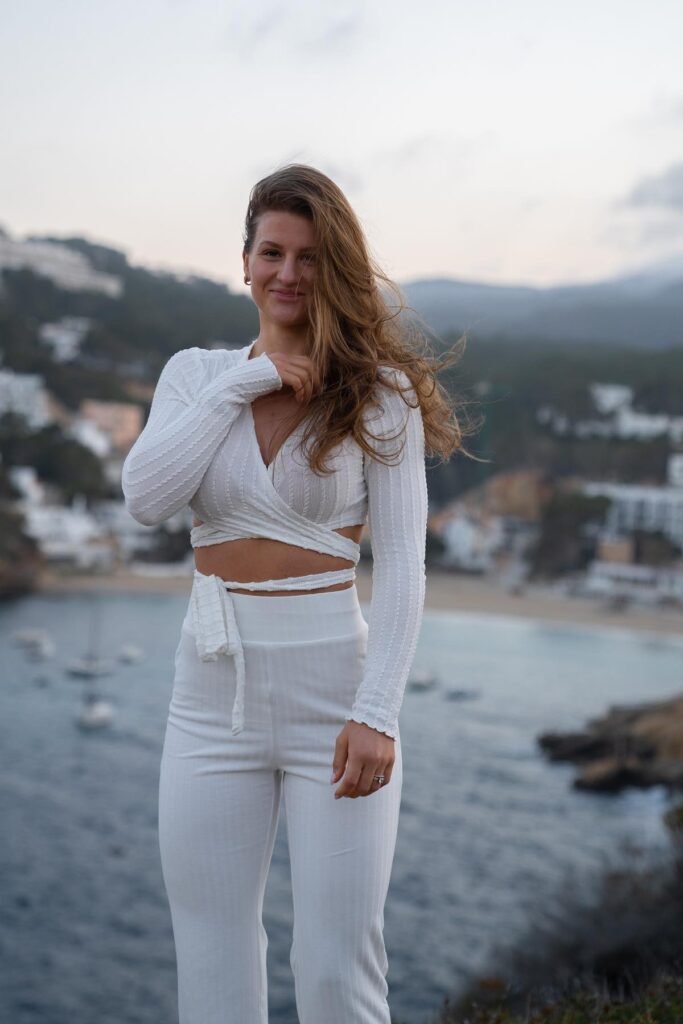 White Ribbed Wrap-Around Long-Sleeve Crop Top + White High-Waisted Flared Trousers
