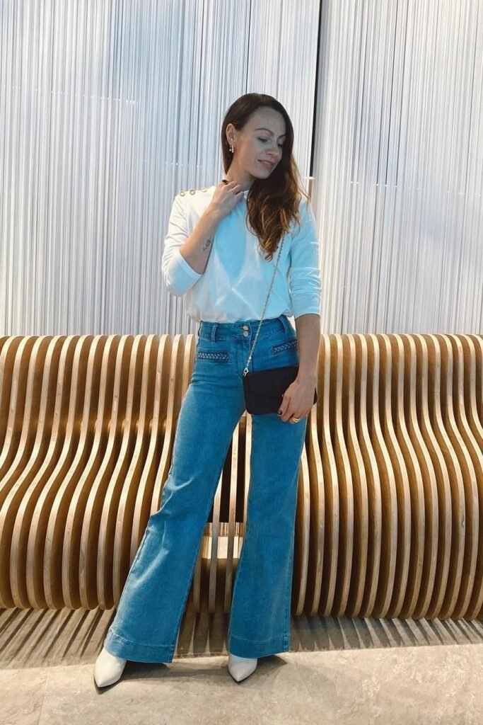 White Shoulder-Button Top + Blue Wide-Leg Jeans + White Pointed-Toe Boots