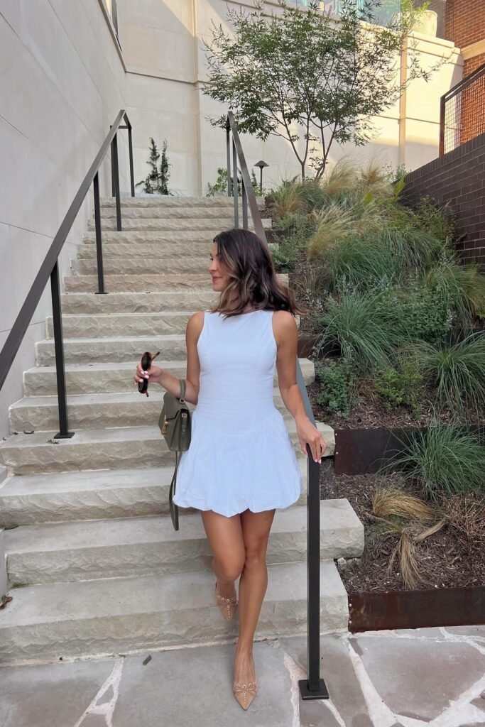 White Sleeveless Mini Bubble Dress + Olive Green Handbag + Tan Studded Pumps