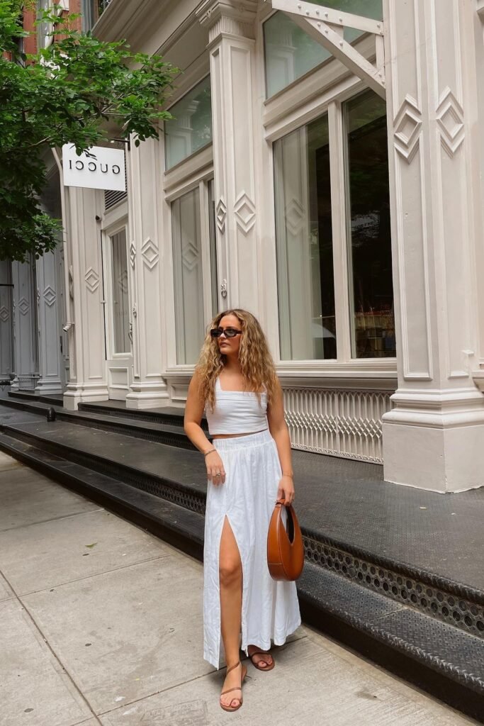 White Square-Neck Crop Top + White Side-Slit Maxi Skirt + Brown Leather Crescent Bag + Brown Strappy Sandals