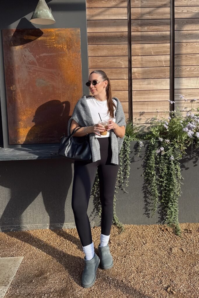 White T-Shirt + Grey Sweater (over shoulders) + Black Leggings + Grey Mini Boots