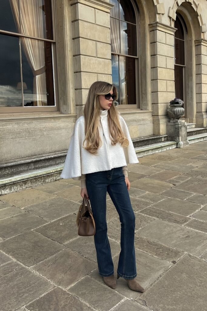 White Textured Cape + Dark Wash Flare Jeans + Brown Suede Pointed Boots